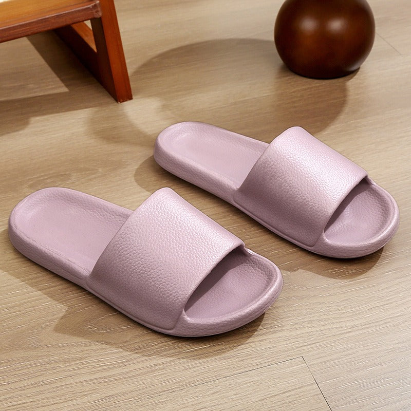 EVA shit-stepping couple home bath slippers