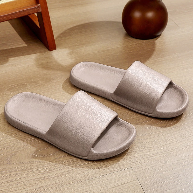 EVA shit-stepping couple home bath slippers