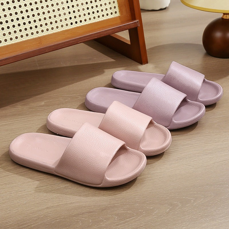 EVA shit-stepping couple home bath slippers